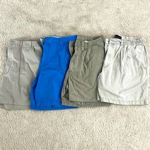 Mens shorts with stretchy side, belt loops, and button. Size 38. No holes/stains
